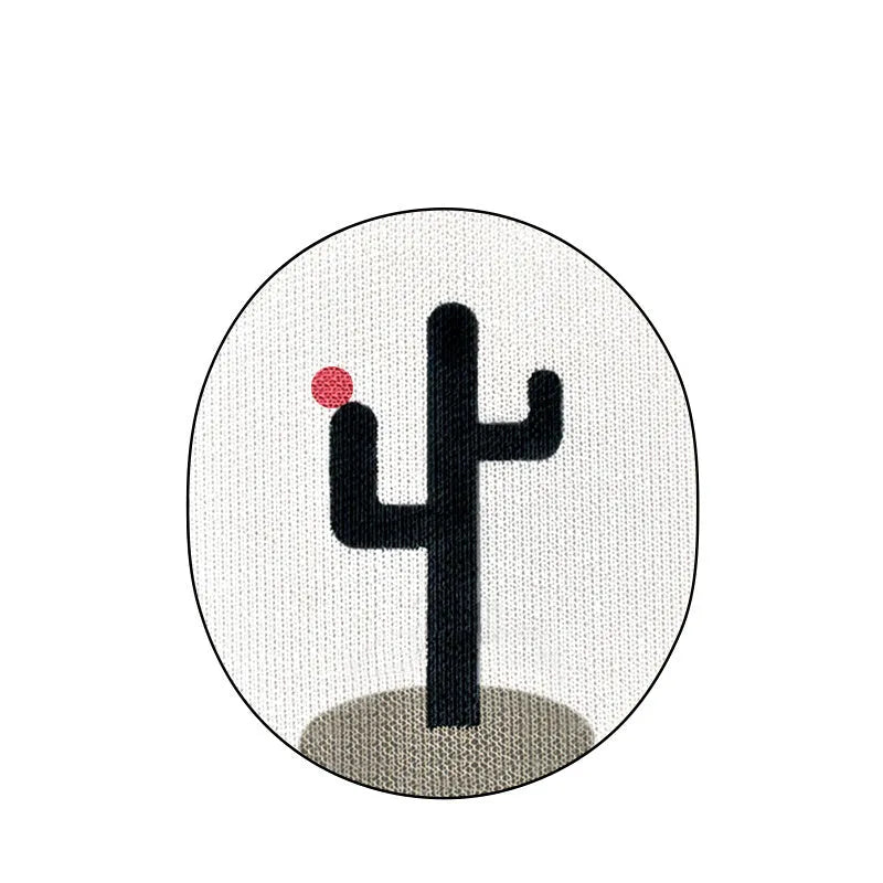 Wall mounted corrugated cardboard cat scratch pad with catnip in cactus design
