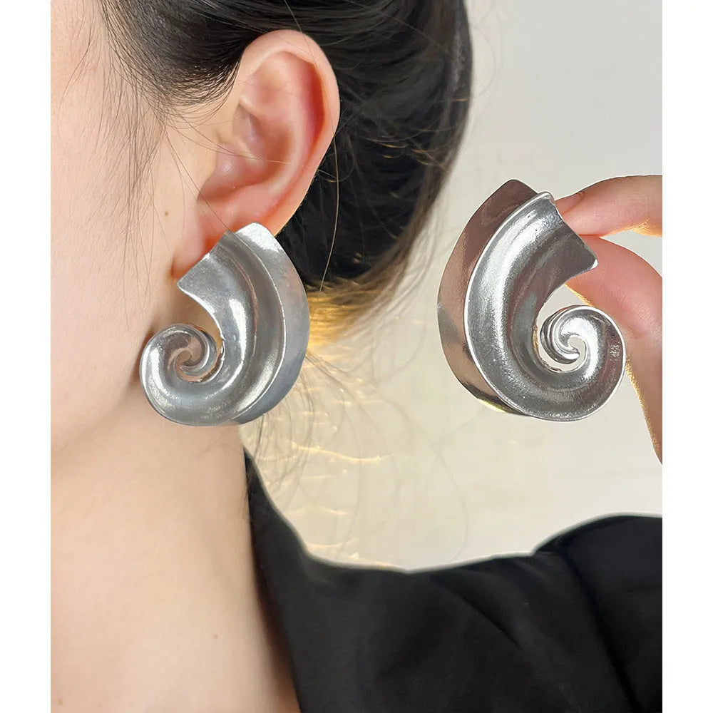 Geometric retro design alloy ear studs in gold or silver colour, 5cm size.