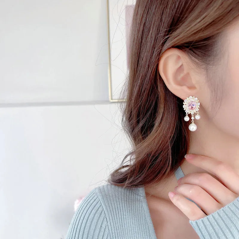 Geometric oval pearl tassel earrings with zircon detailing in light purple colour