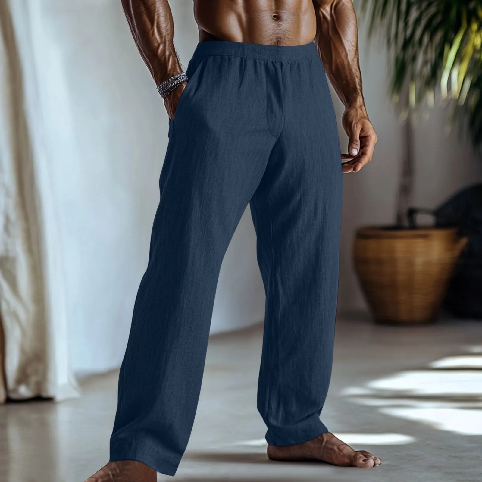 Men's straight leg casual trousers in light green cotton and linen fabric with visible pockets