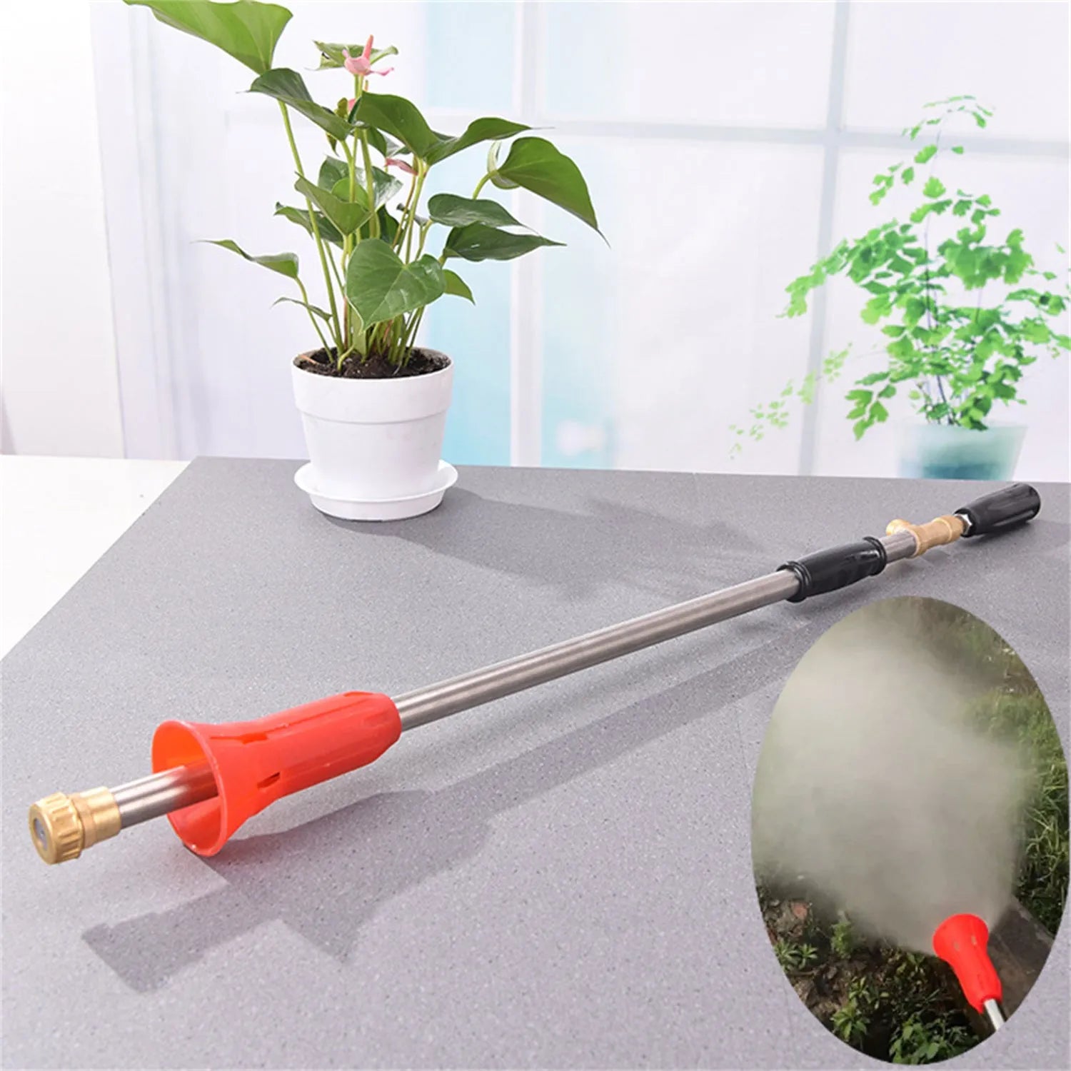 Adjustable high-pressure agricultural spray gun in submachine gun style, made from plastic.