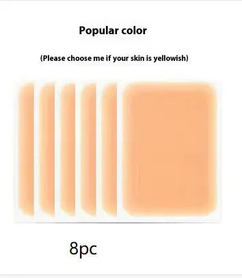 Pack of adhesive tattoo cover patches in various skin tone colours on a white background.