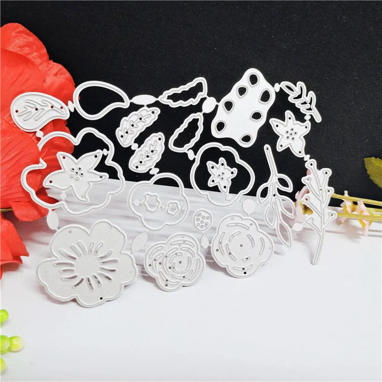 Silver carbon steel flower-shaped cutting mould measuring 14.3 by 9.9 centimetres