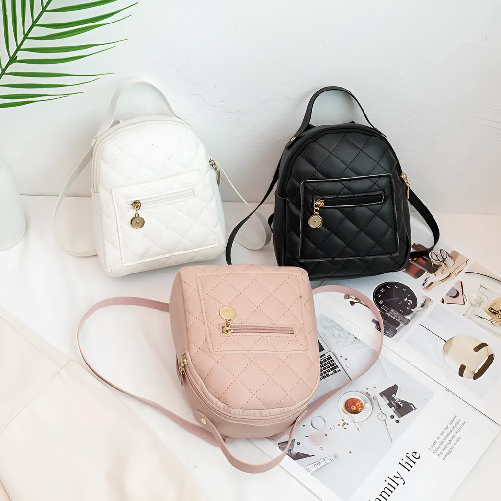 Girls' hard shell backpack with embroidery in black, pink, or white colours showing square shape and sandwich pocket