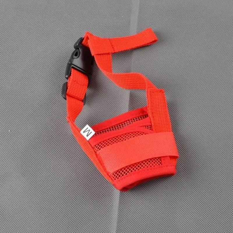 Adjustable plastic dog muzzle in assorted colours on a size chart showing measurements from 12cm to 34cm.