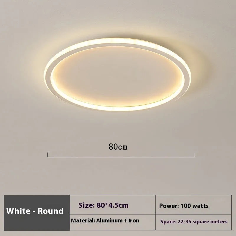 Minimalist circular ceiling lamp in black finish with dimmable LED lighting and three colour temperature options