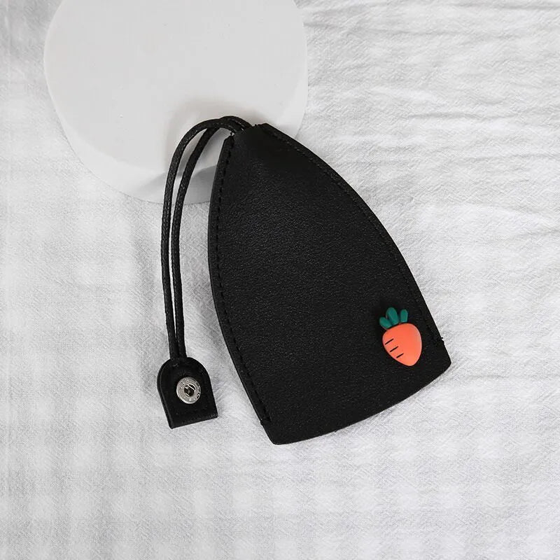 Cartoon design pull-out car key case made from soft PU leather, showing approximate size.