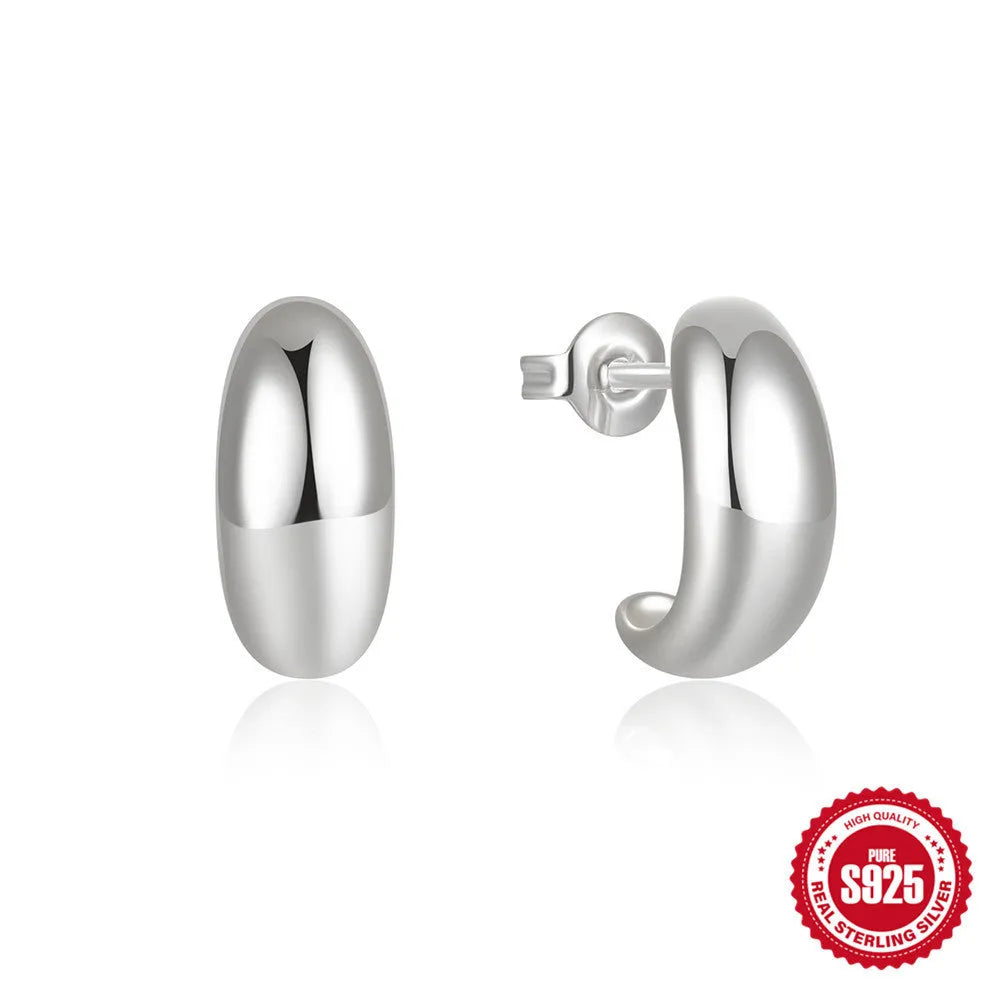 Sterling silver C-shaped geometric ring stud earrings in gold or silver tone.