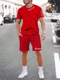 Lightweight quick-dry short-sleeved top and matching shorts sports set on a neutral background.
