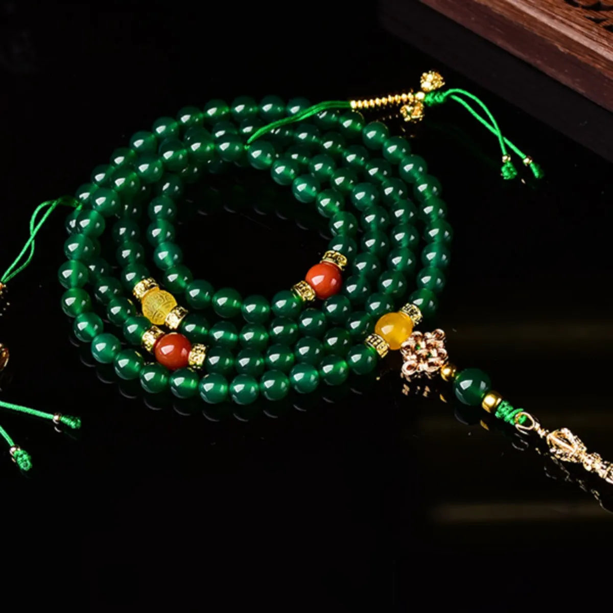 Brazil natural green agate multi-circle bracelet shown in hand, with certificate.