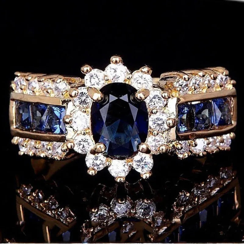 Personalised zinc alloy fashion ring with diamond and blue or purple zircon stone designs.
