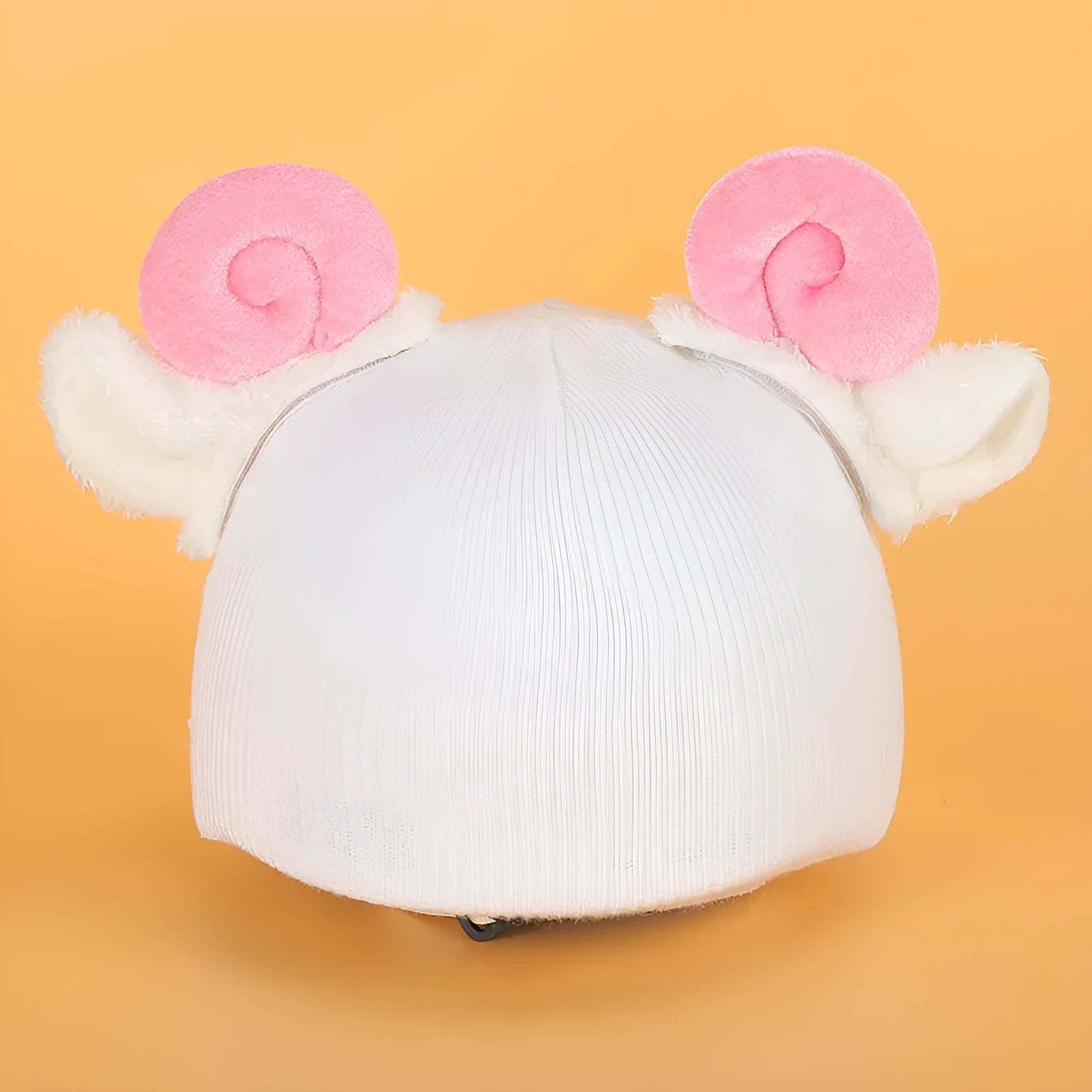 A plush fabric helmet cover with cartoon character ears, shown in size M for bicycle or motorbike use.