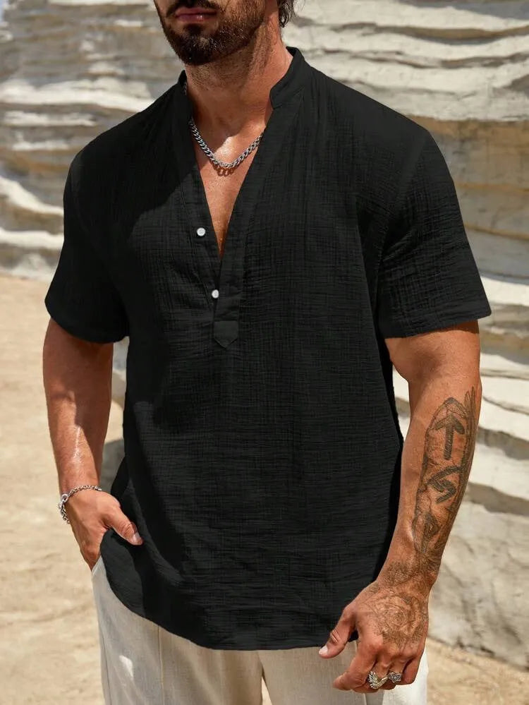 Men's solid colour short-sleeve shirt with a stand collar on a hanger.