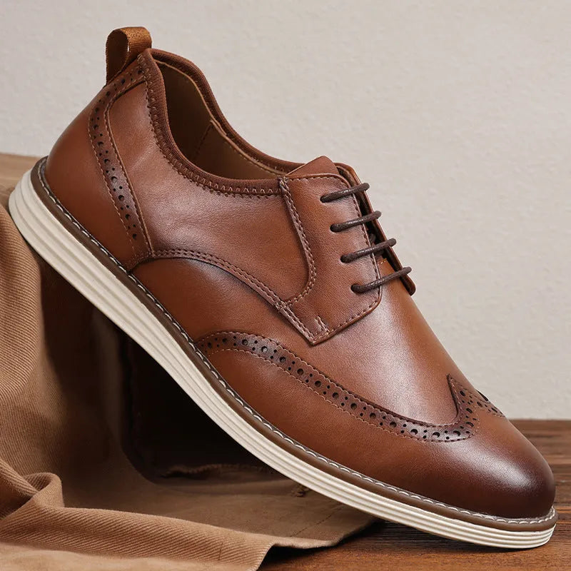 Men's black and brown slip-on business casual shoes with round toe and carving details on low-top PU upper
