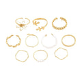 Openwork flower design ring set in glossy gold alloy for women