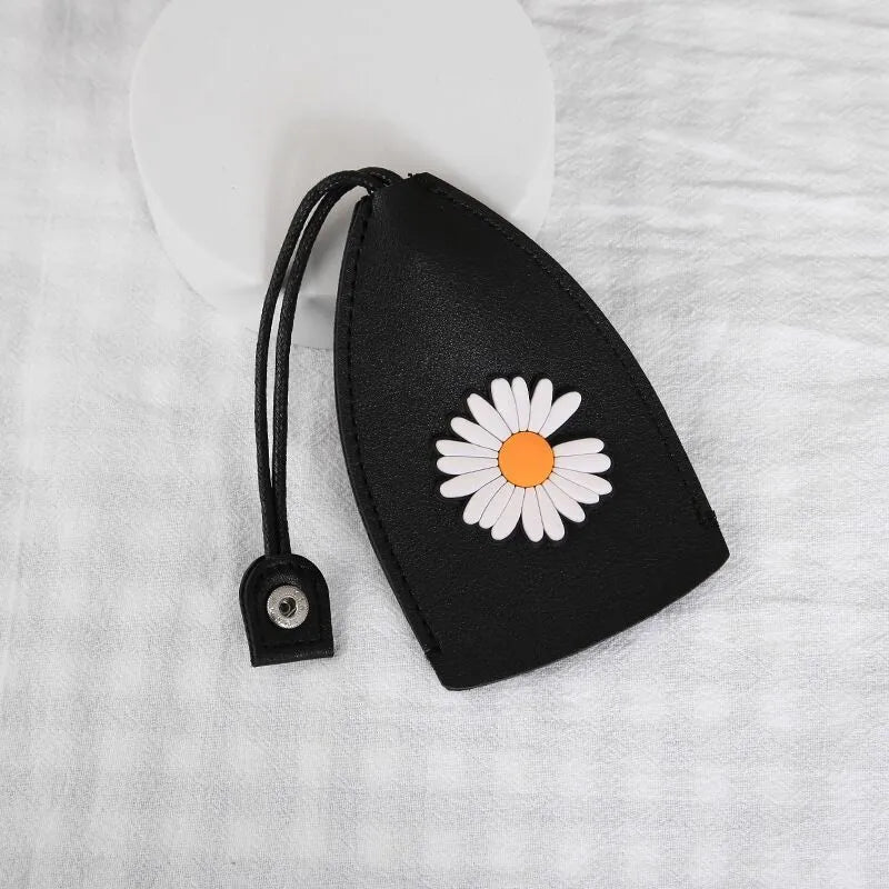 Cartoon design pull-out car key case made from soft PU leather, showing approximate size.