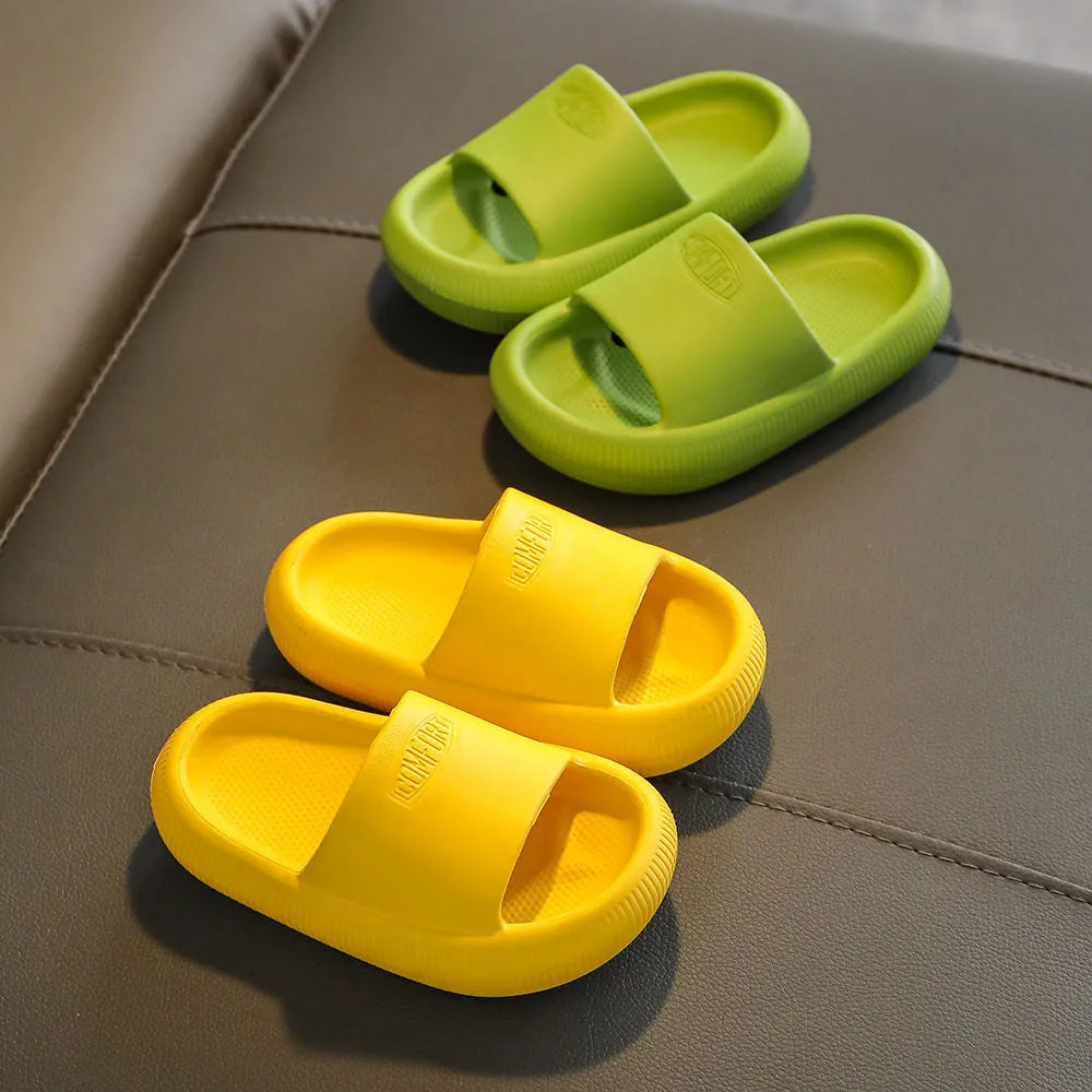 Children's mixed colour EVA slippers with non-slip soles showing size options from 15.5cm to 21.5cm