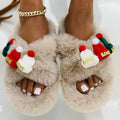 Women's black Christmas hat design faux plush slippers with a hairy texture and rubber sole.