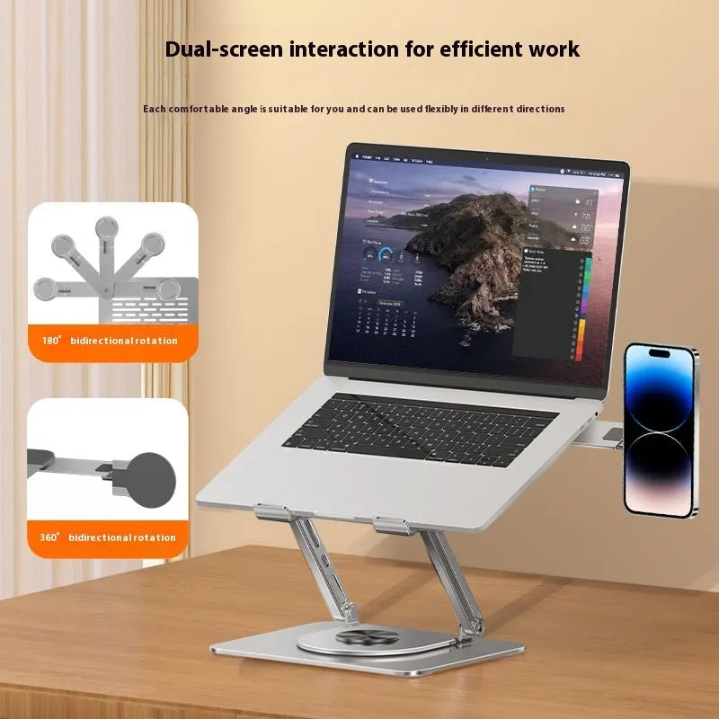 Silver carbon steel laptop stand on a desk, shown rotated with a phone attached to its magnetic holder.