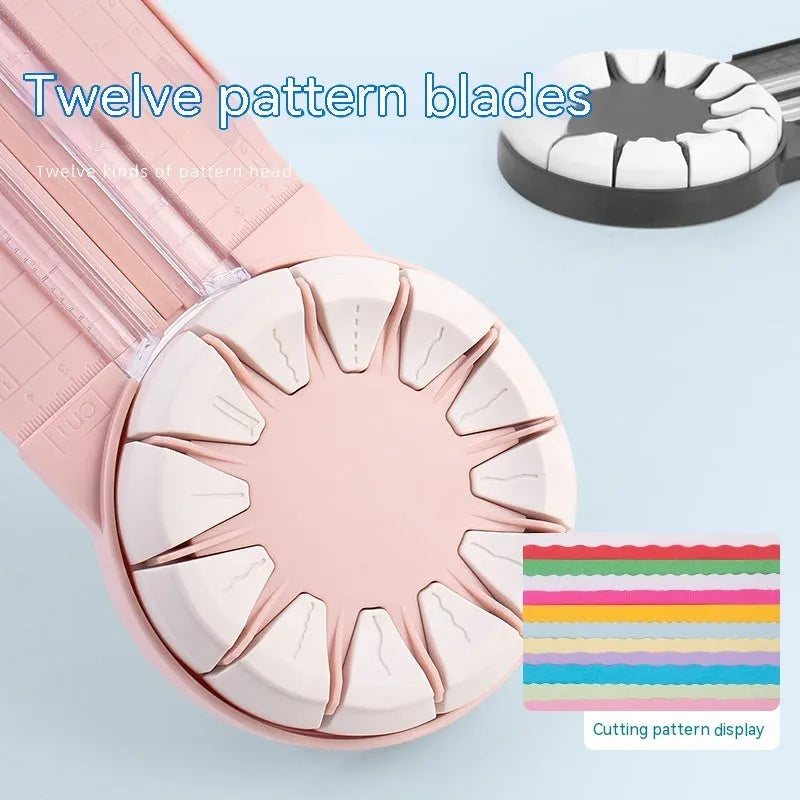 Plastic paper cutting machine with 12 multifunctional heads in pink colour on craft table