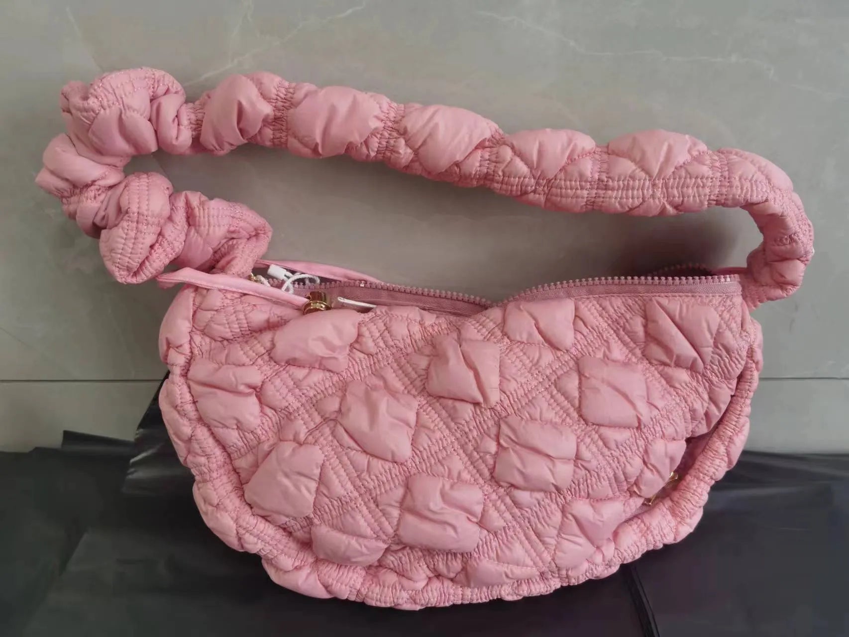 Women's nylon shoulder messenger bag in beige colour showing dimensions and adjustable strap
