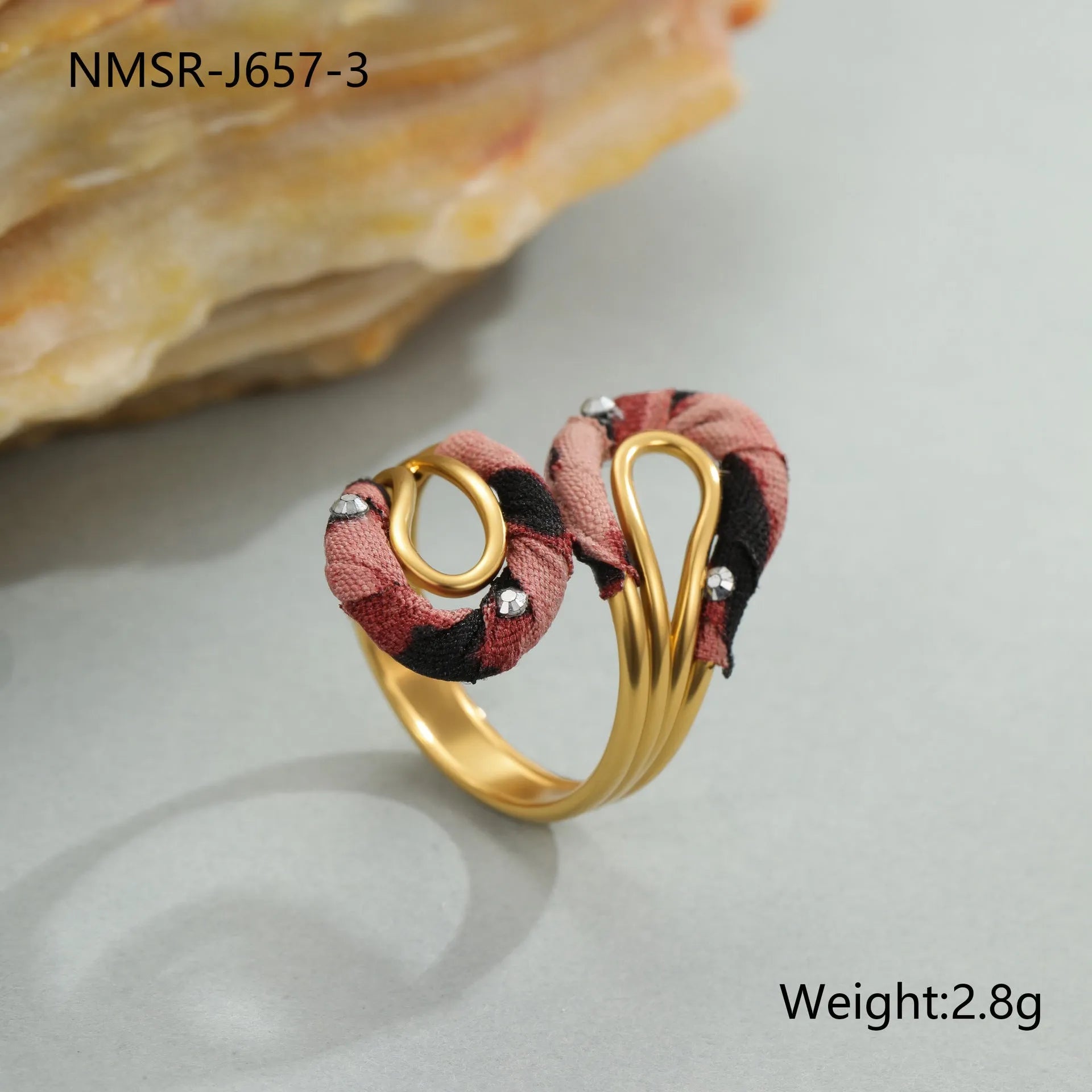Leopard print geometric open mouth adjustable ring in stainless steel, showing heart shape on finger.