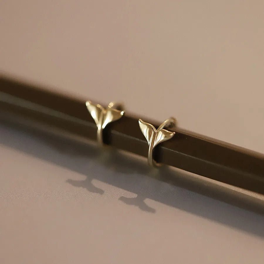 925 sterling silver fishtail earrings with golden plating, approximately 8mm diameter