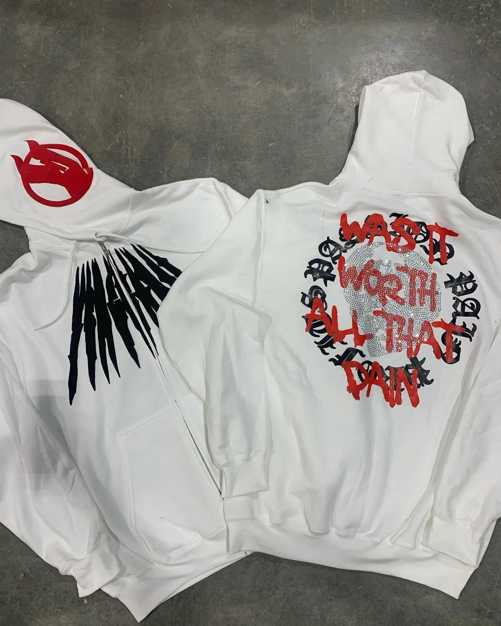 Black loose hooded sweatshirt with printed skull pattern and hot rhinestone detailing, cardigan style