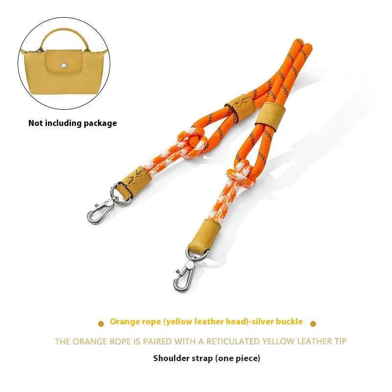 Braided nylon and cowhide leather crossbody shoulder strap with gold alloy buckle on a grey background.