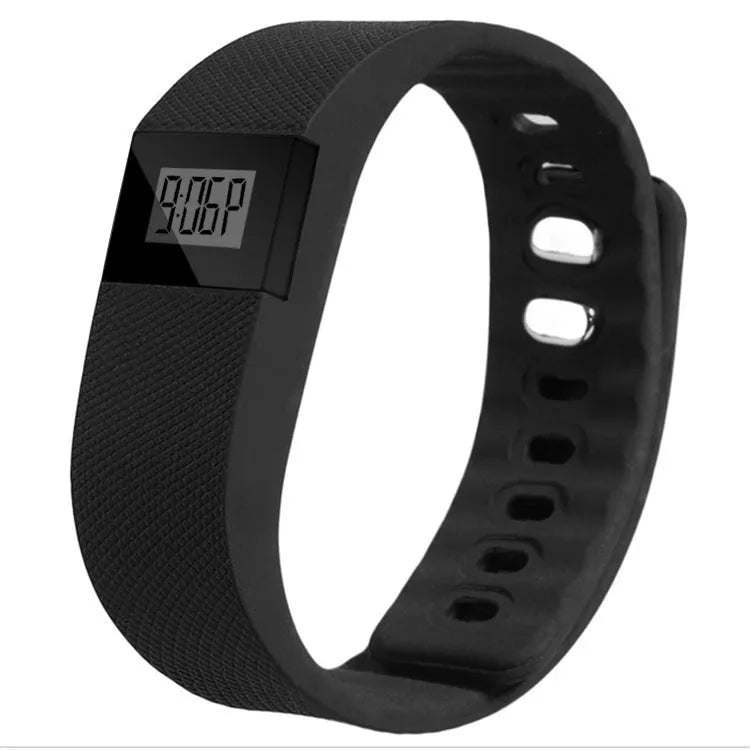 Ordinary bracelet pedometer in black, blue, green, orange or yellow colours showing step distance calorie tracking
