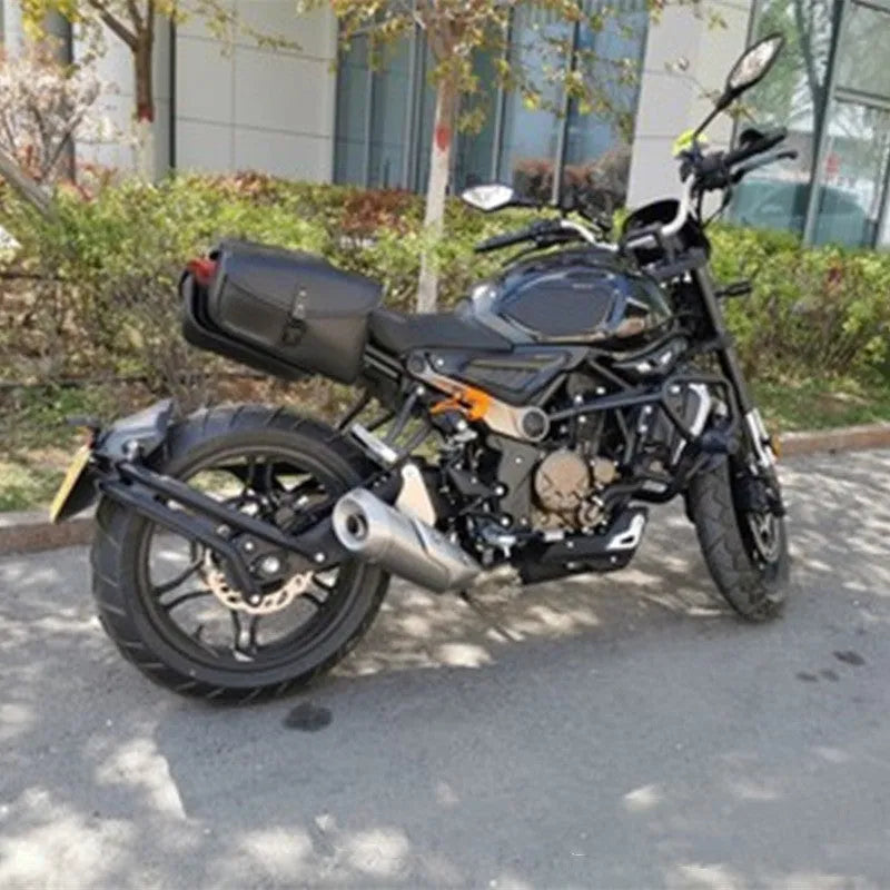 Black motorcycle swingarm side saddlebag mounted on Sportster motorcycle