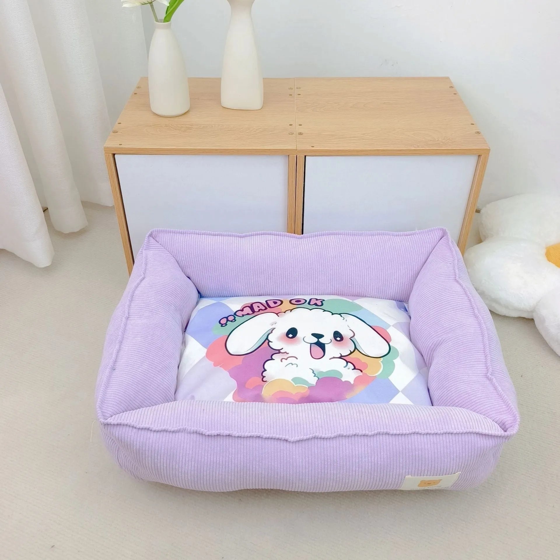 Light blue fine velvet pet nest for dogs and cats with PP cotton filling, shown in 50x40cm size.