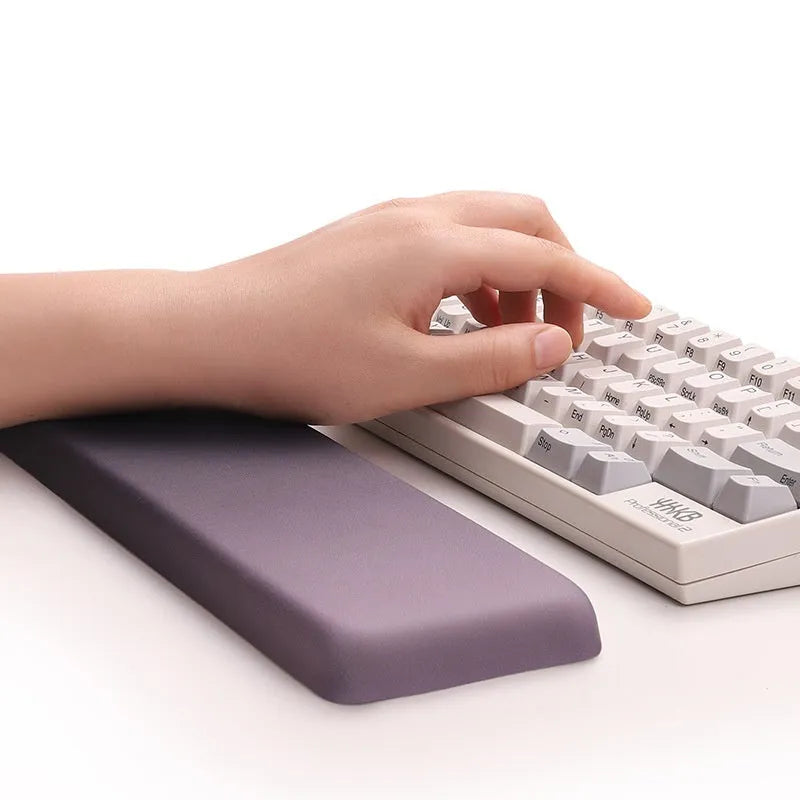 Square silicone wrist support mouse pad with cloth surface measuring 250x180mm