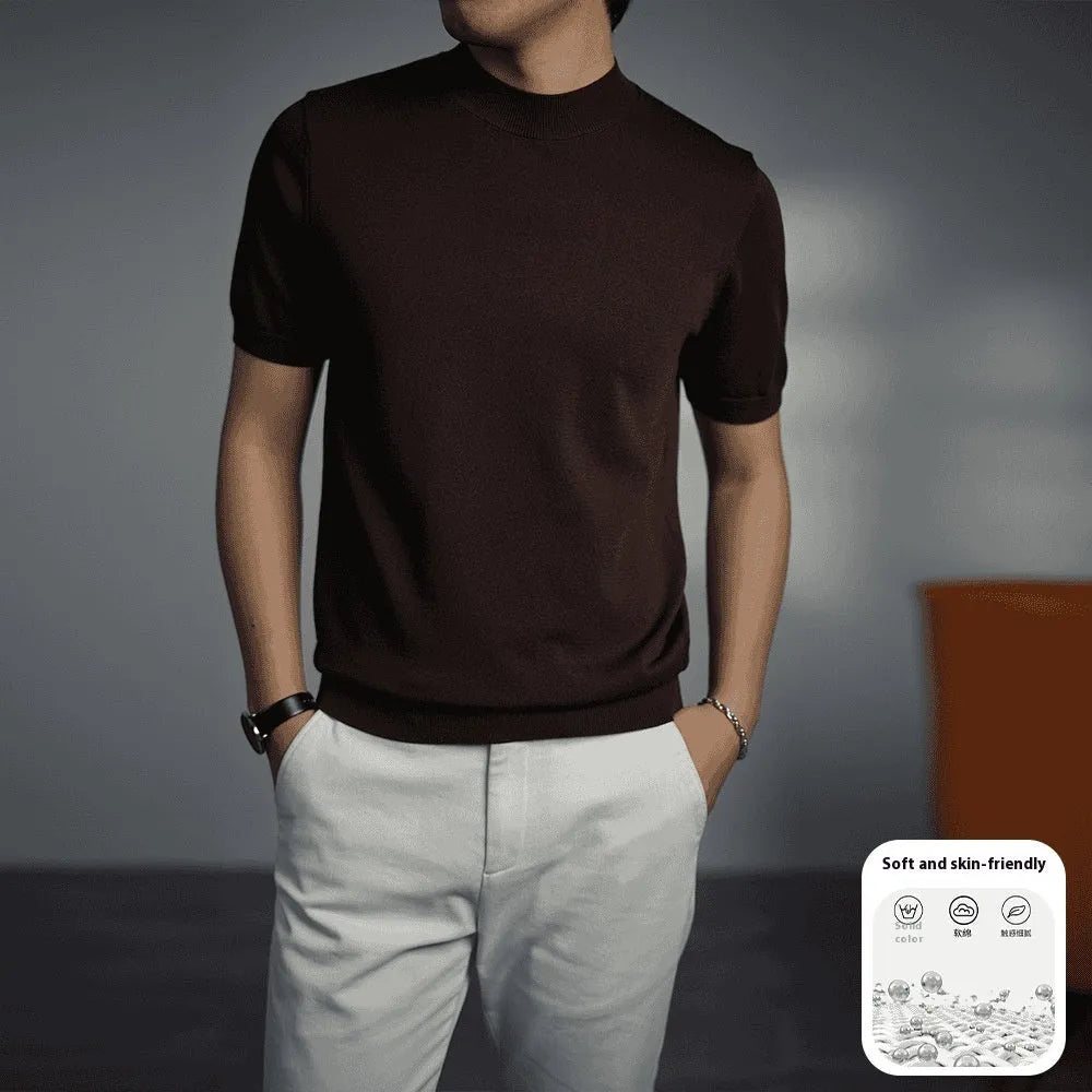 Men's solid colour knitted T-shirt with round neck and short sleeves on a grey background.