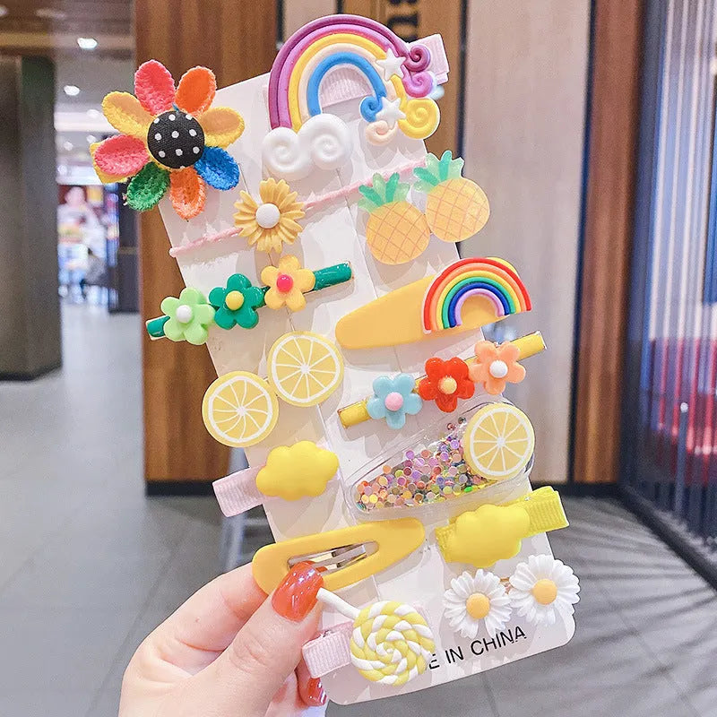 Colourful toddler hair accessories set with 14 pieces including rainbow barrettes, candy fruit pins, and butterfly clips