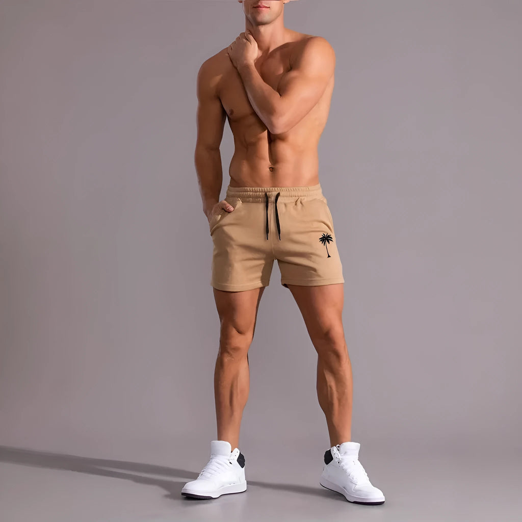 Men's khaki coconut print sports shorts with straight leg cut and elastic waistband