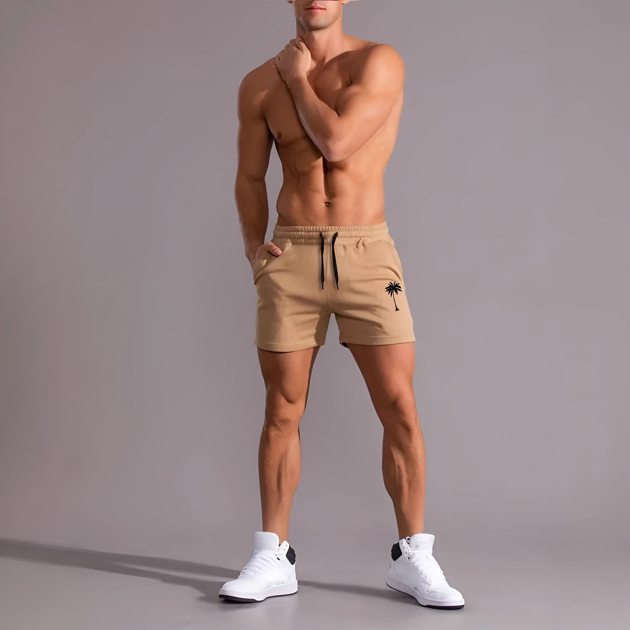 Men's khaki coconut print sports shorts with straight leg cut and elastic waistband