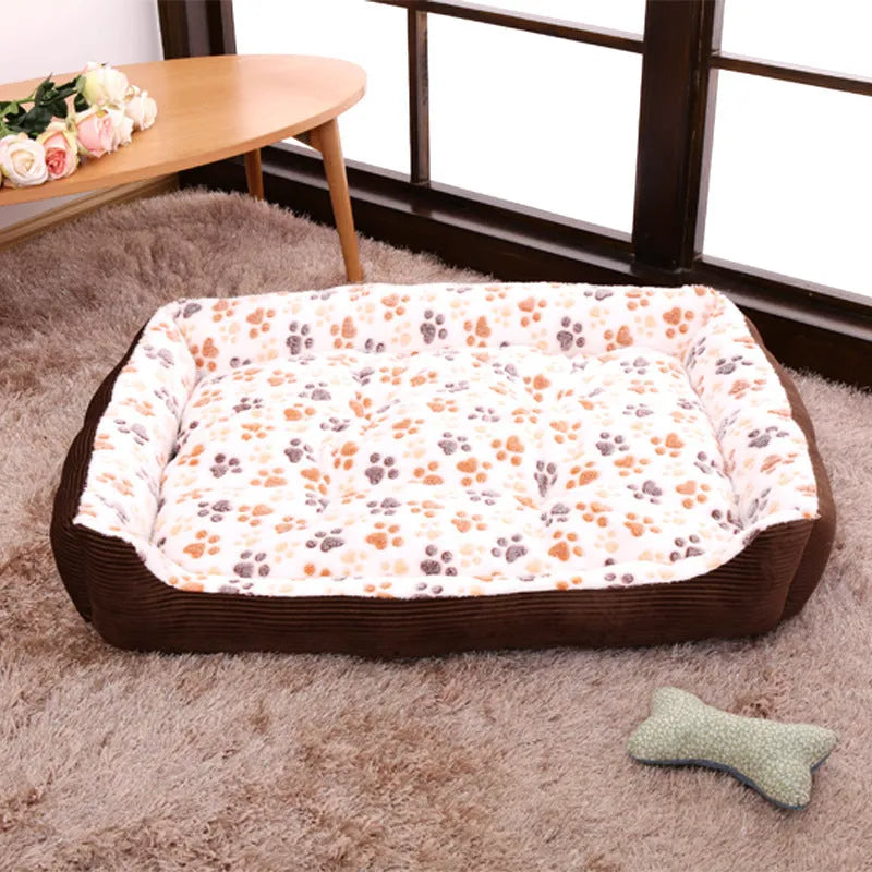 Beige plush bolster dog bed for a small dog, showing raised edges and soft fabric.