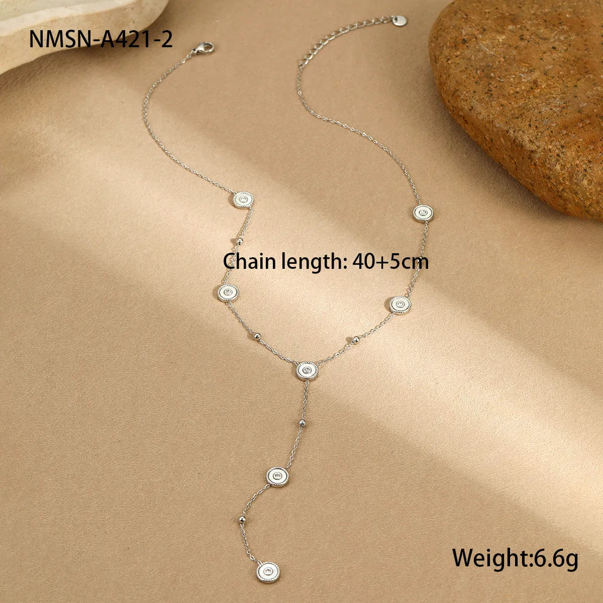 Geometric fritillary pattern stainless steel bracelet with 18K gold plating and matching necklace