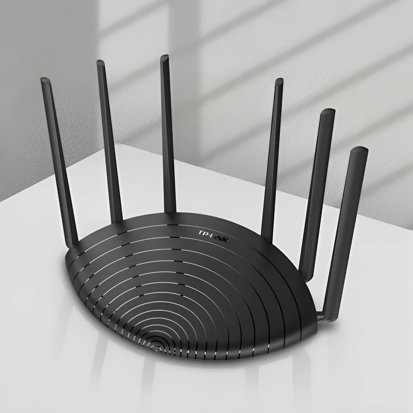 TL-WDR7661 Gigabit Edition AC1900 wireless home router on a desk