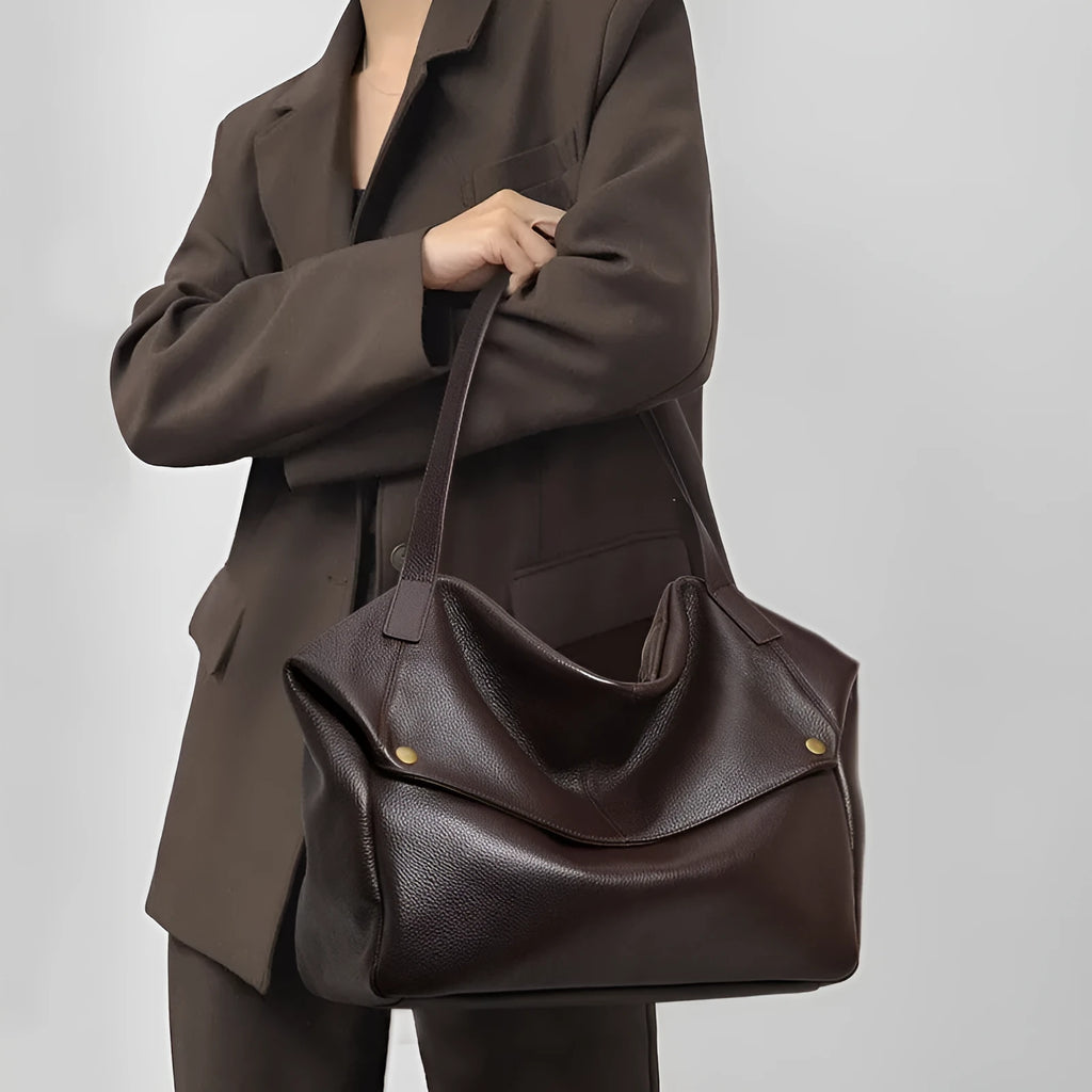 Brown genuine leather women's commuter shoulder bag with horizontal square shape and internal zipper organisation