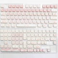 Full set of PBT sublimation printed key caps for mechanical keyboards showing multi-colour patterns