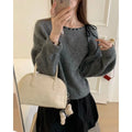 Women's loose-fitting black and grey knitwear pullover sweater with regenerated cellulose fibre construction