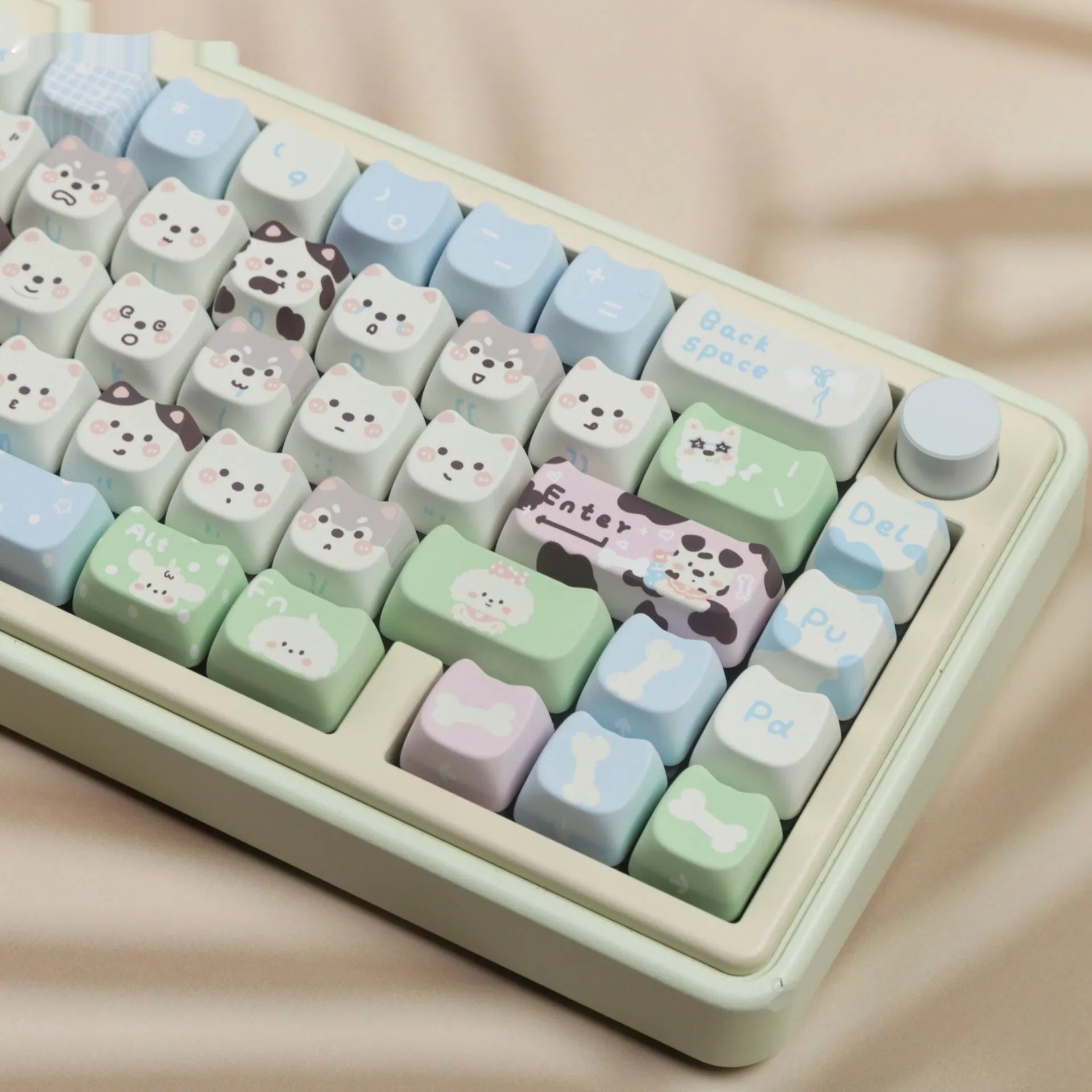 PBT sublimation key cap set showing colourful cat and puppy character designs on mechanical keyboard keys