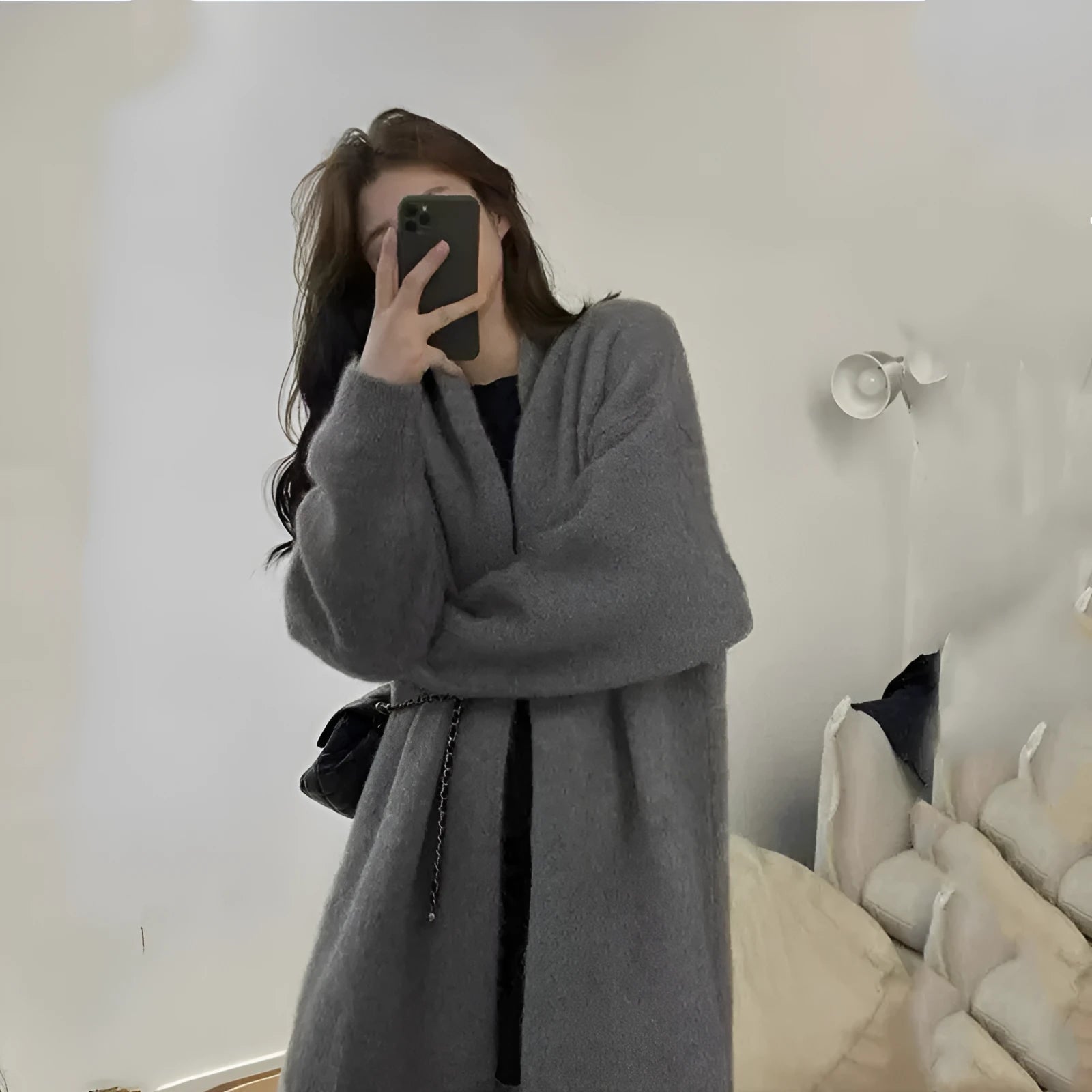 Loose dark grey knitted women's cardigan with 3D pattern texture and open front.