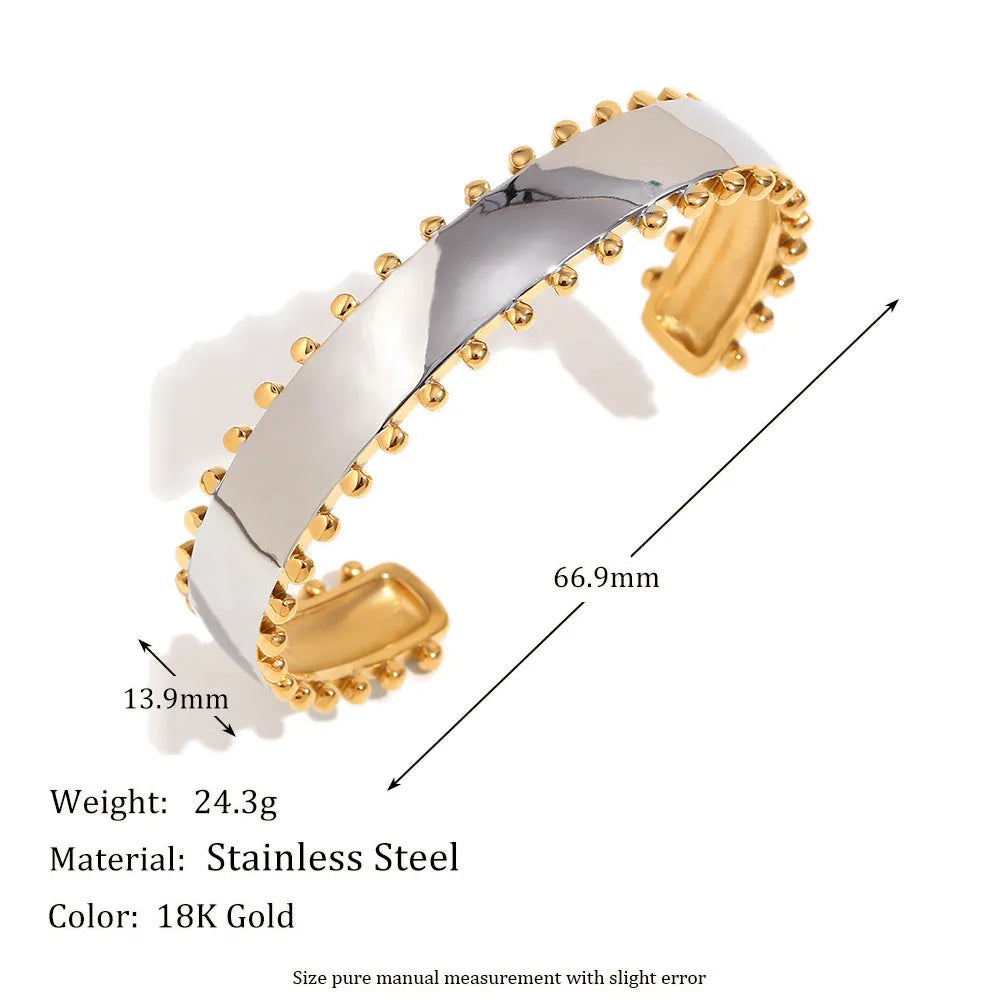 Gold electroplated women's jewellery set with geometric earrings, bracelet, and necklace on stainless steel