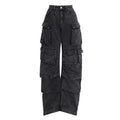 Woman wearing blue tie-dyed high waist wide leg denim trousers with multiple pockets