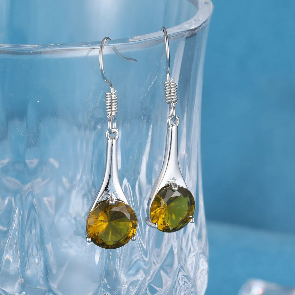 Olive green topaz earrings with water drop shape and electroplated alloy construction