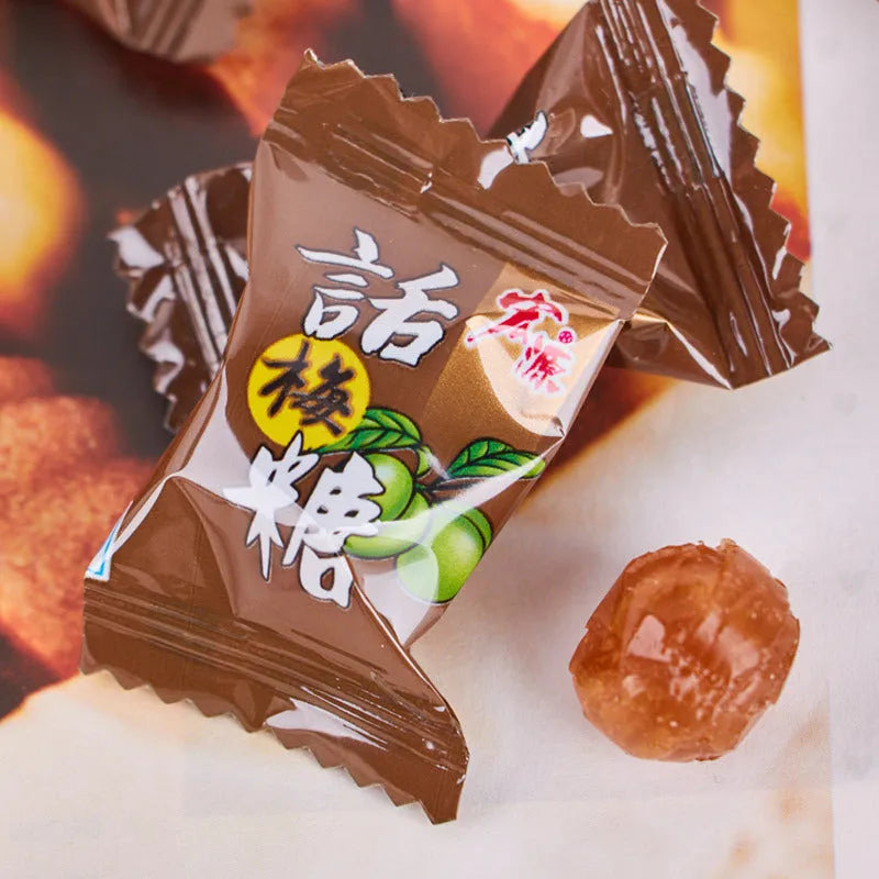 Bag containing separate packs of Plum Sugar, Guava, and Tangerine Peel flavoured hard candies.