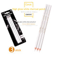 Three white charcoal pencils with wooden casings for drawing on dark paper